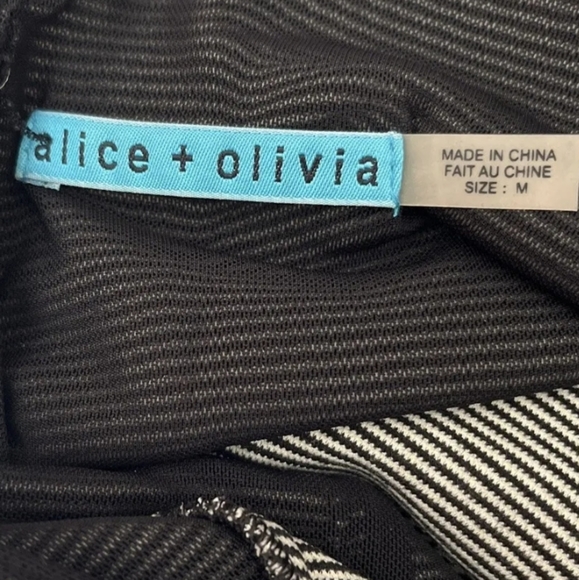 Alice + Olivia black & white stripped peplum dress with scoop back. Size M. - Picture 6 of 10